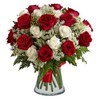 Send Flowers to India comprising Red White Roses Vase 36 Flowers in India